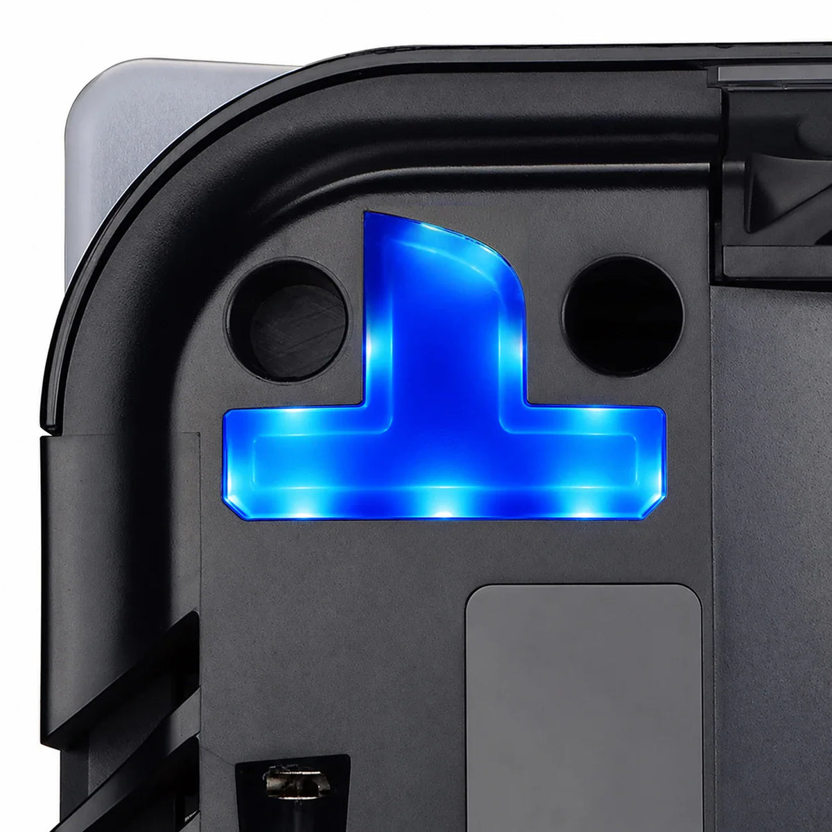 Close-up of a blue illuminated RGB LED console logo light kit installed in the internal casing.
