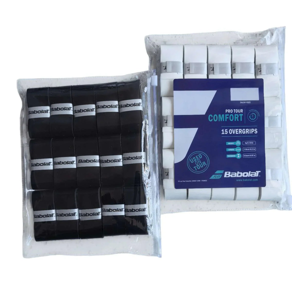 A collection of black tennis racket overgrips in plastic packaging.