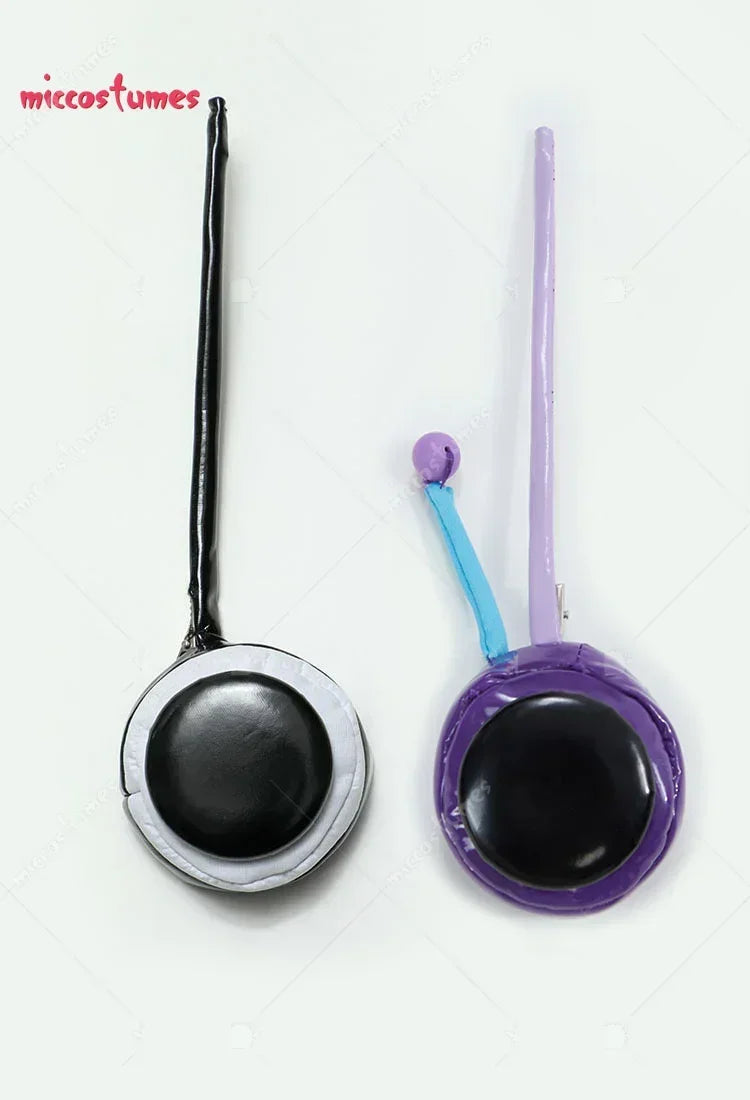 Black and violet circular cosplay headphone accessories with antennas side by side