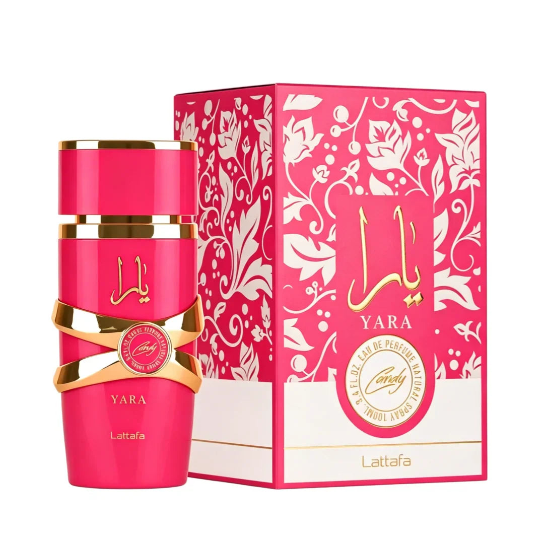 Pink bottle of Yara Candy perfume standing next to its floral patterned retail box