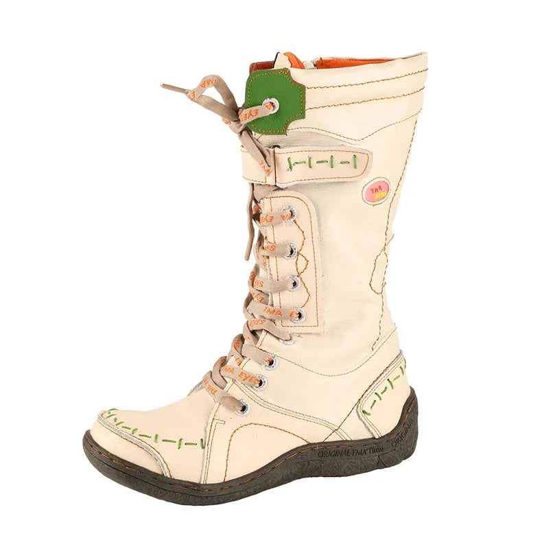 Beige mid-calf lace-up boots with green accent tab on the side