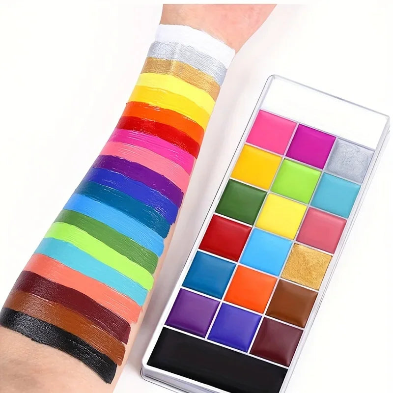 A professional face and body paint palette with color swatches painted on an arm