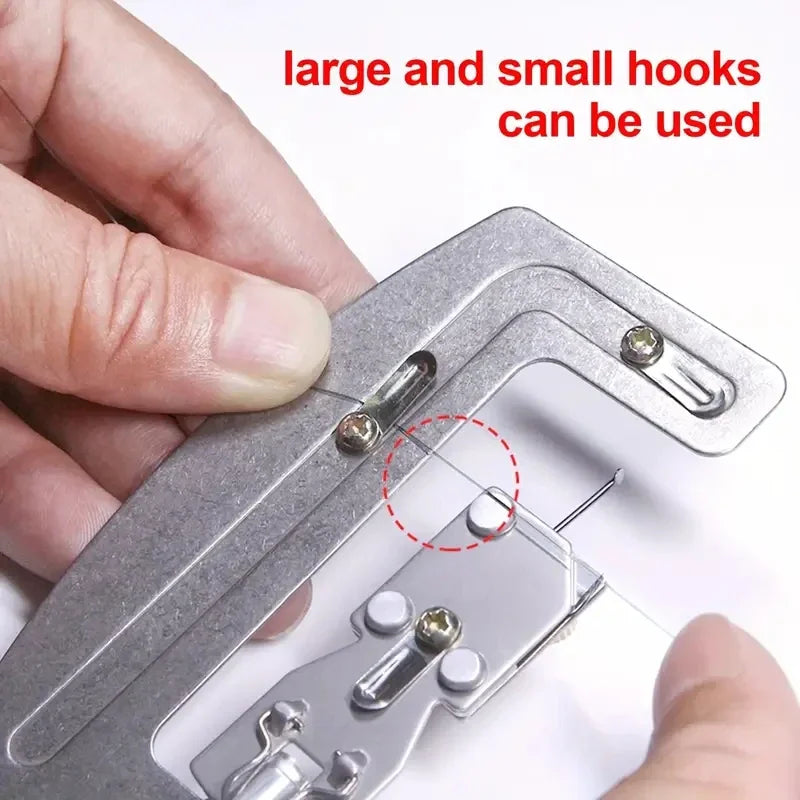 Close up of stainless steel fishing hook tying tool being used to tie a hook