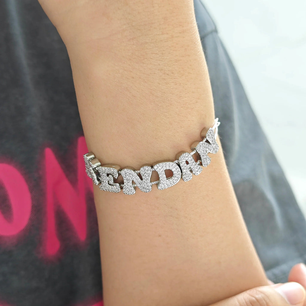 Custom alphabet letter slide bracelet with a double mesh chain in a metallic finish.