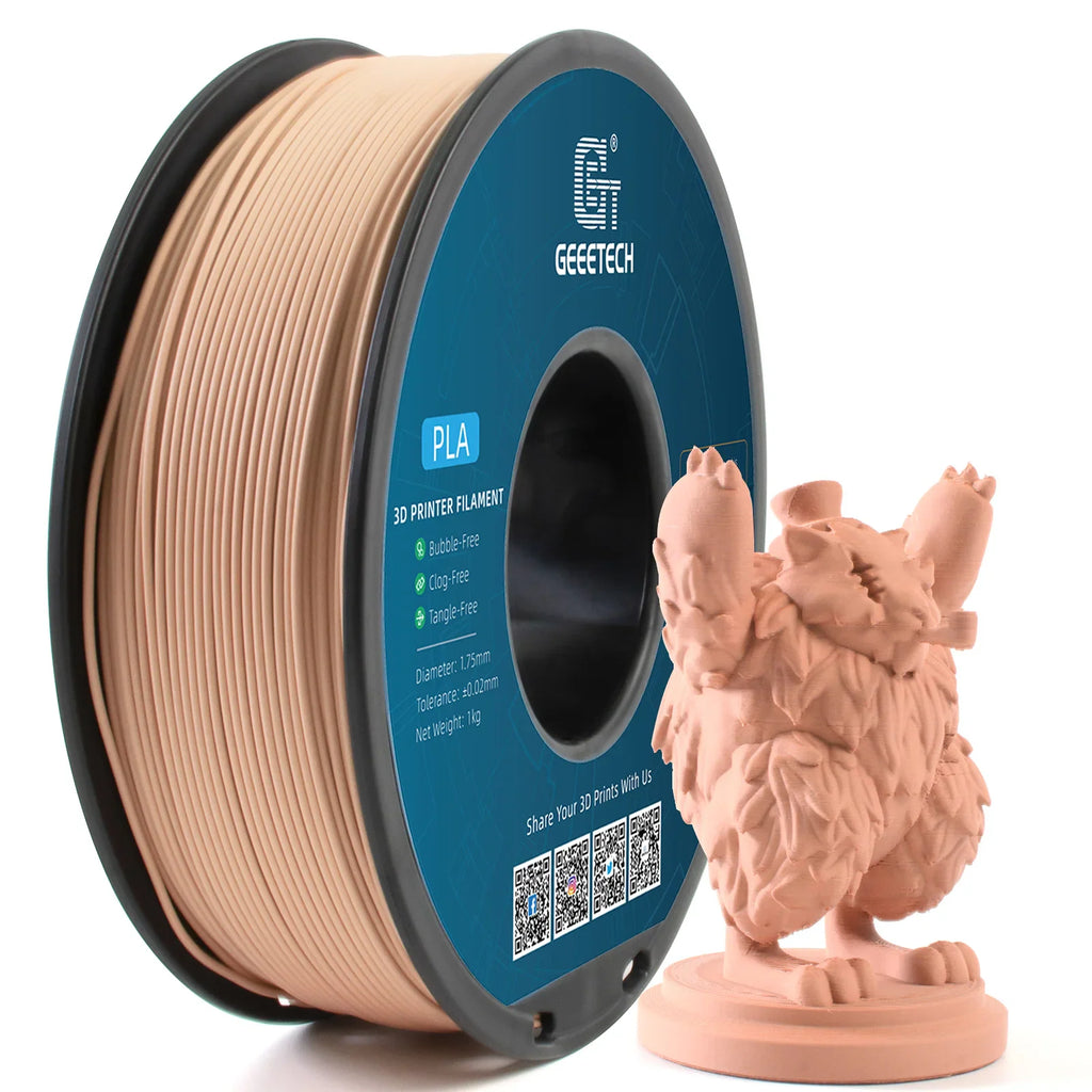 A spool of light beige PLA 3D printer filament next to a small printed monster figurine.