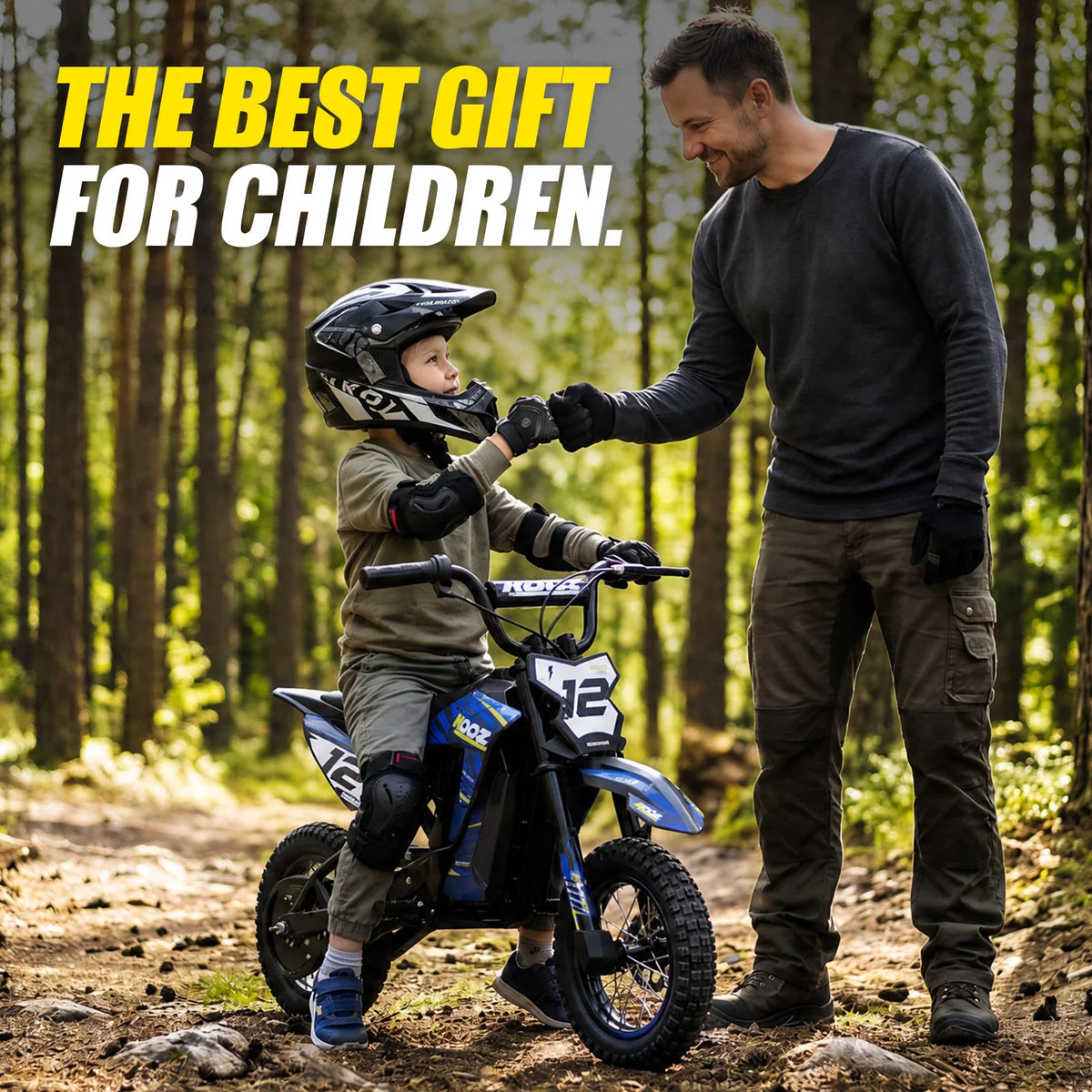 A father and son fist-bumping in a forest while the son is on an electric dirt bike.