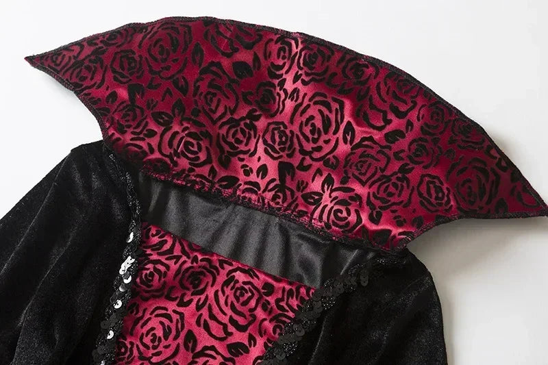 Close-up of the red and black floral patterned high collar on a vampire costume