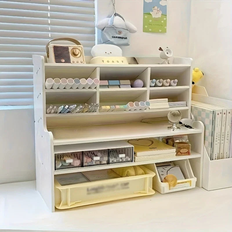 White tiered desktop organizer with open slots and clear drawers