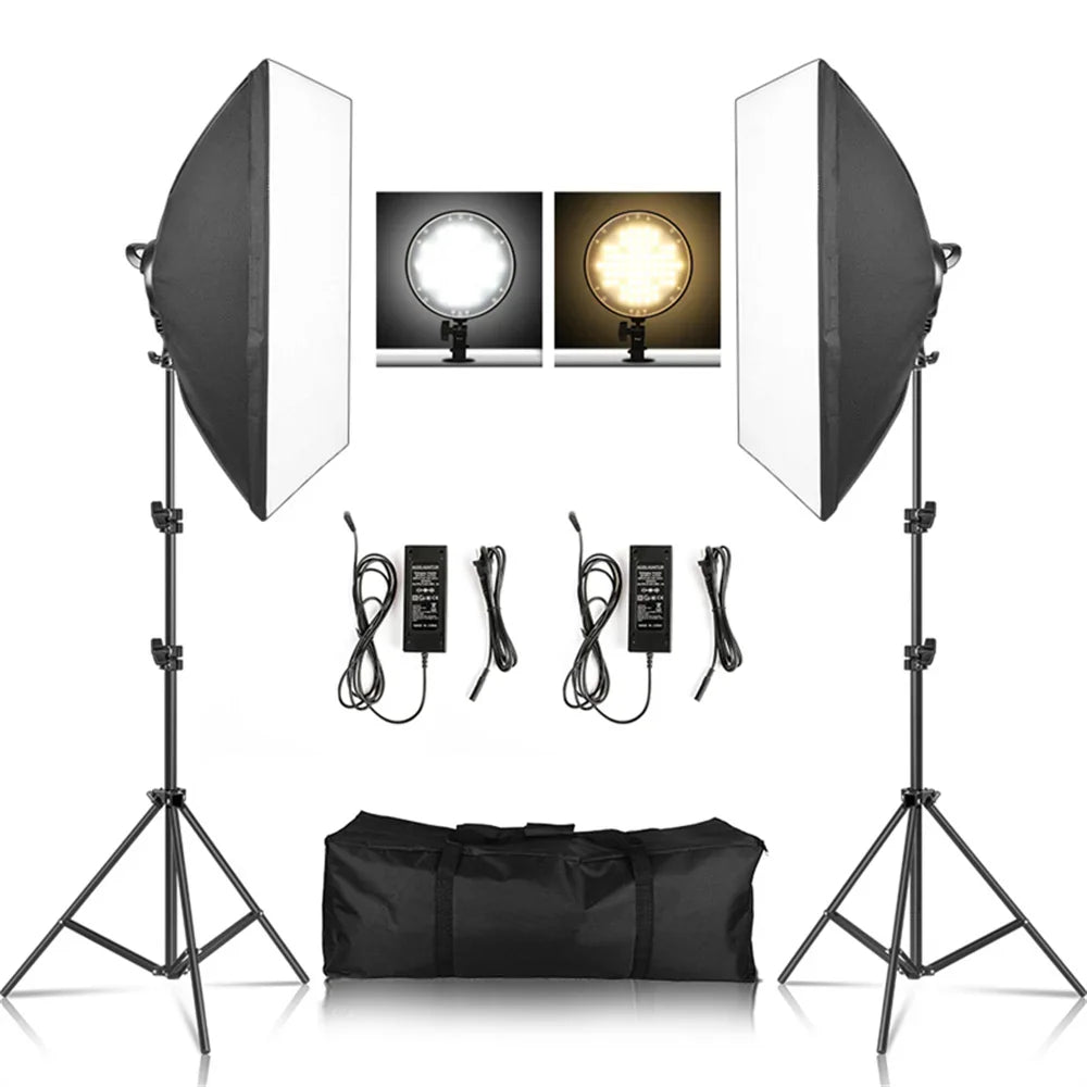 Photography softbox lighting kit with two stands, two LED lamps, cables, and a carrying bag.
