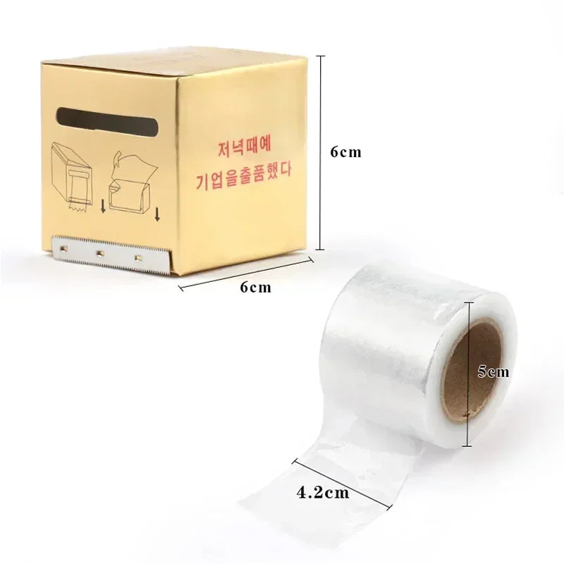 Gold dispenser box and roll of clear film with dimensions labeled
