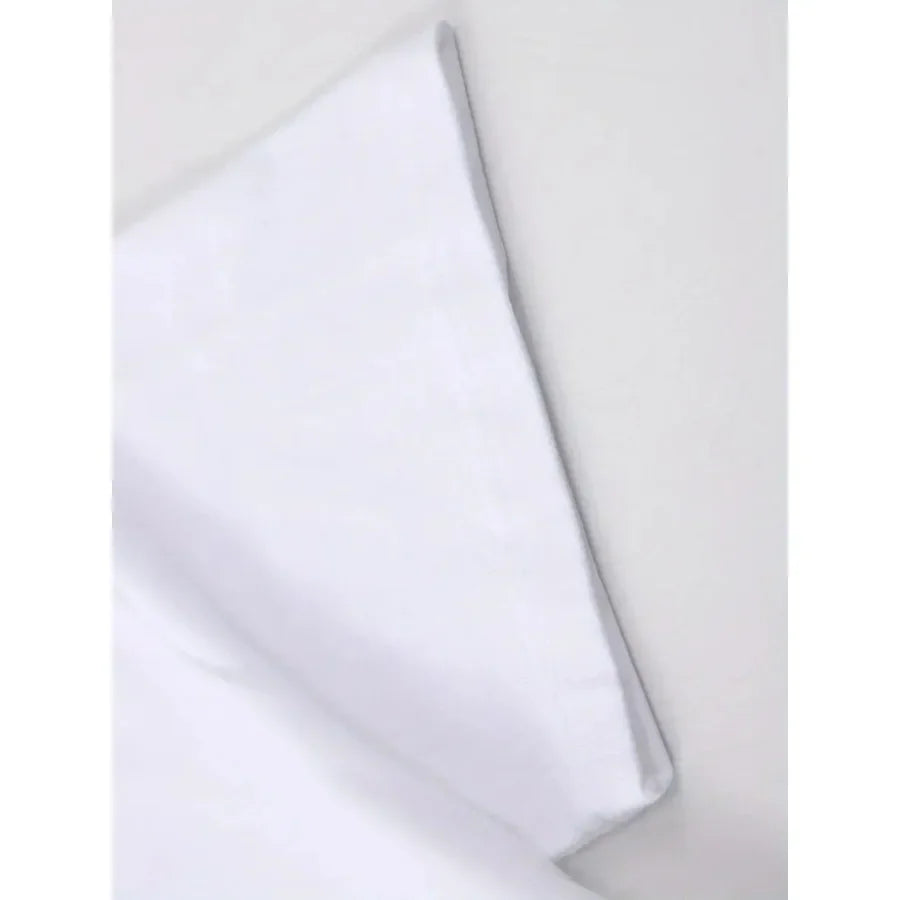 Close-up of a plain white cotton t-shirt sleeve.