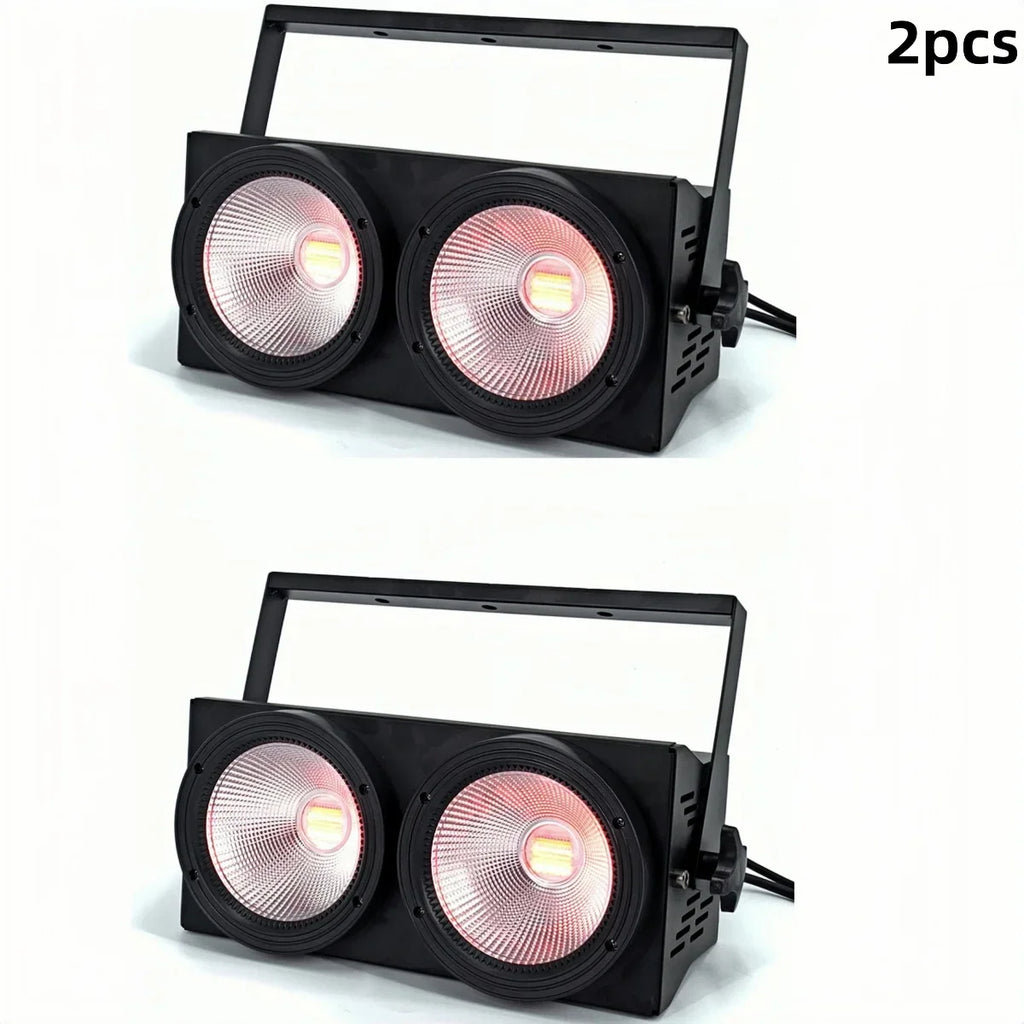 Pair of black dual-lens stage audience blinder lights on white background