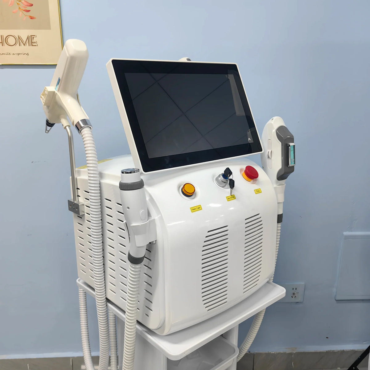 White professional multifunctional laser beauty equipment with handheld probes