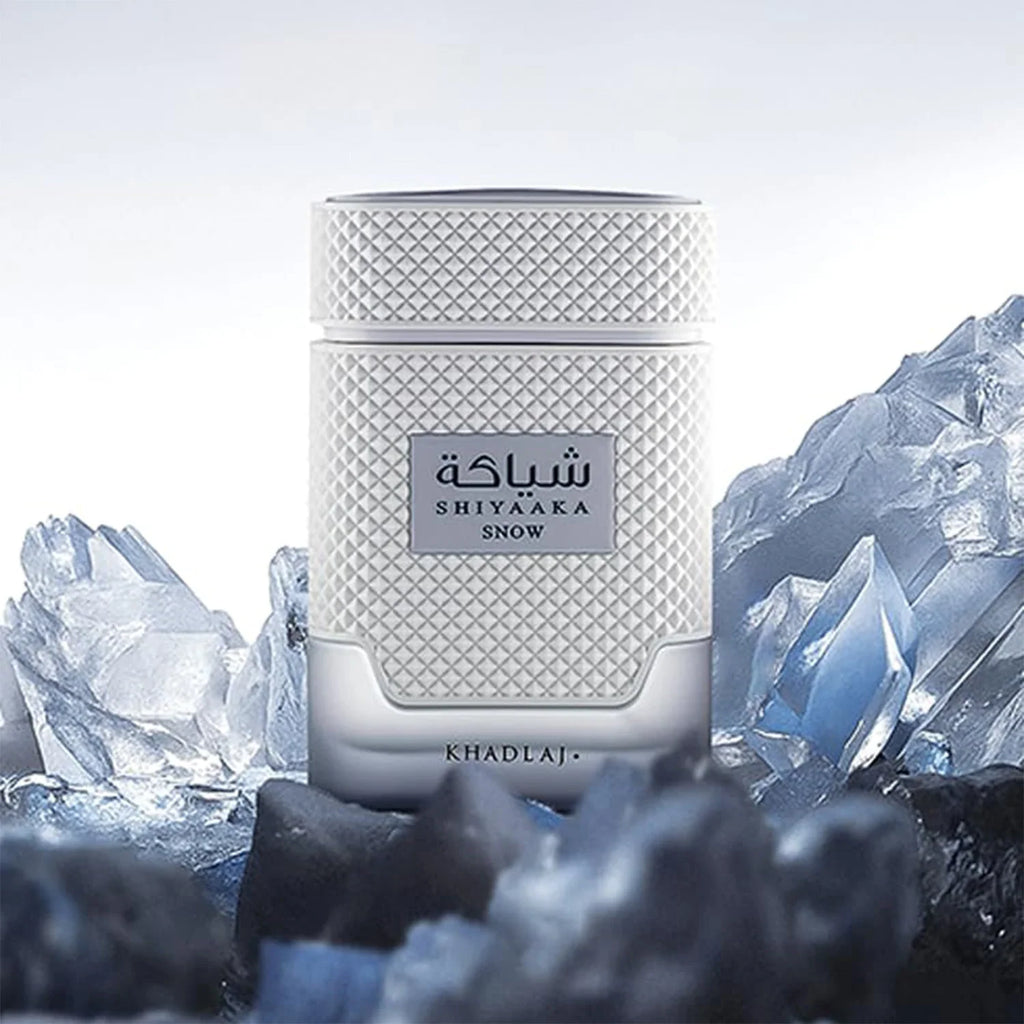 White textured perfume bottle standing among jagged blue ice shards