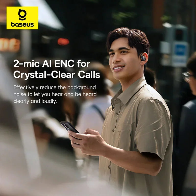 Man using black wireless open-ear earphones outdoors.