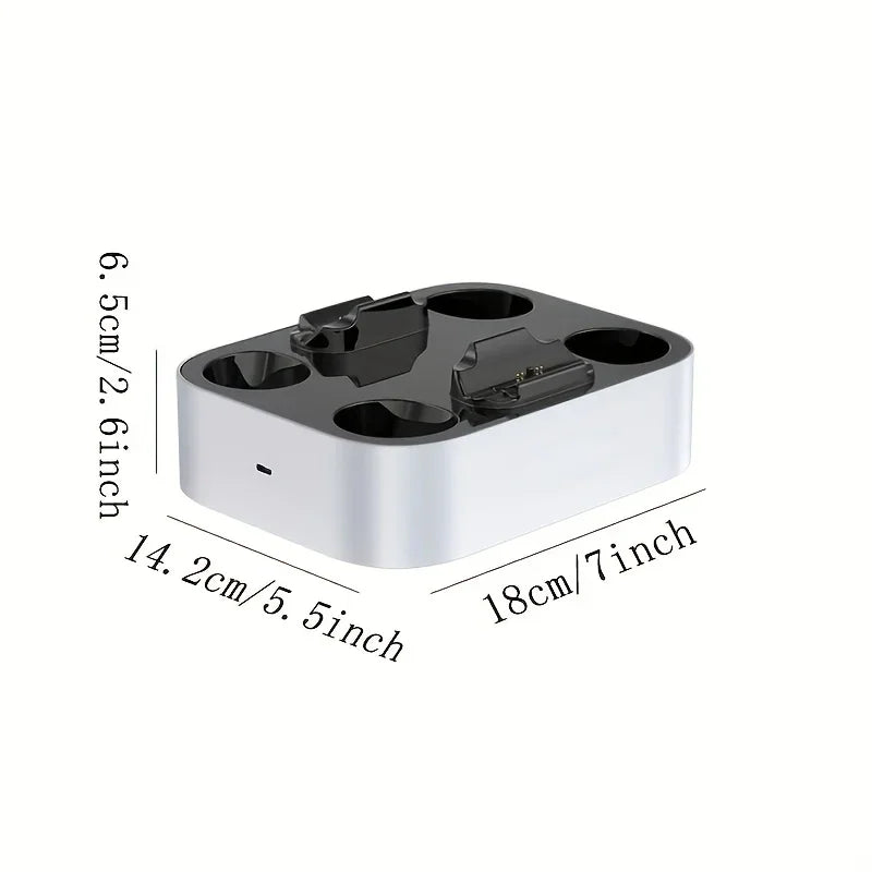 White and black charging dock for game controllers with size dimensions