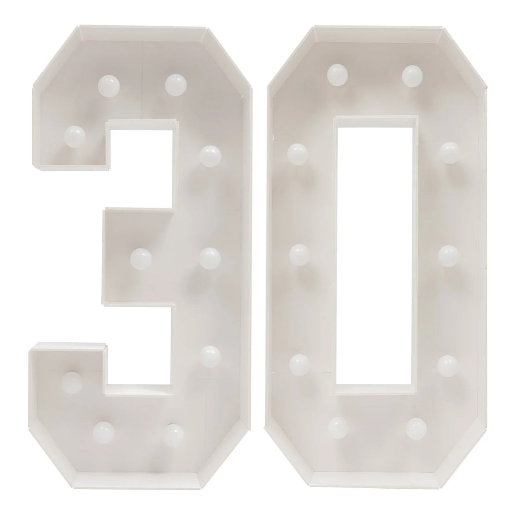 Large white light-up number 30 with glowing bulbs for birthday decorations