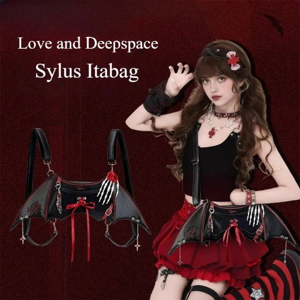 Model wearing a gothic red and black bat-wing ita bag.