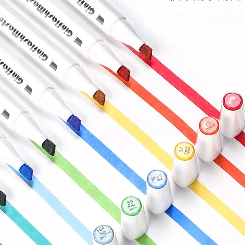 A selection of dual-tip art markers showing colored ink strokes on white paper