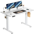 Electric height adjustable standing desk with white top and white legs