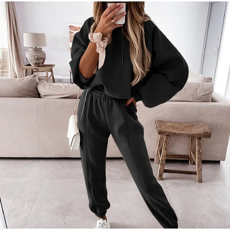 Black long sleeve hooded sweatshirt and matching jogger sweatpants set