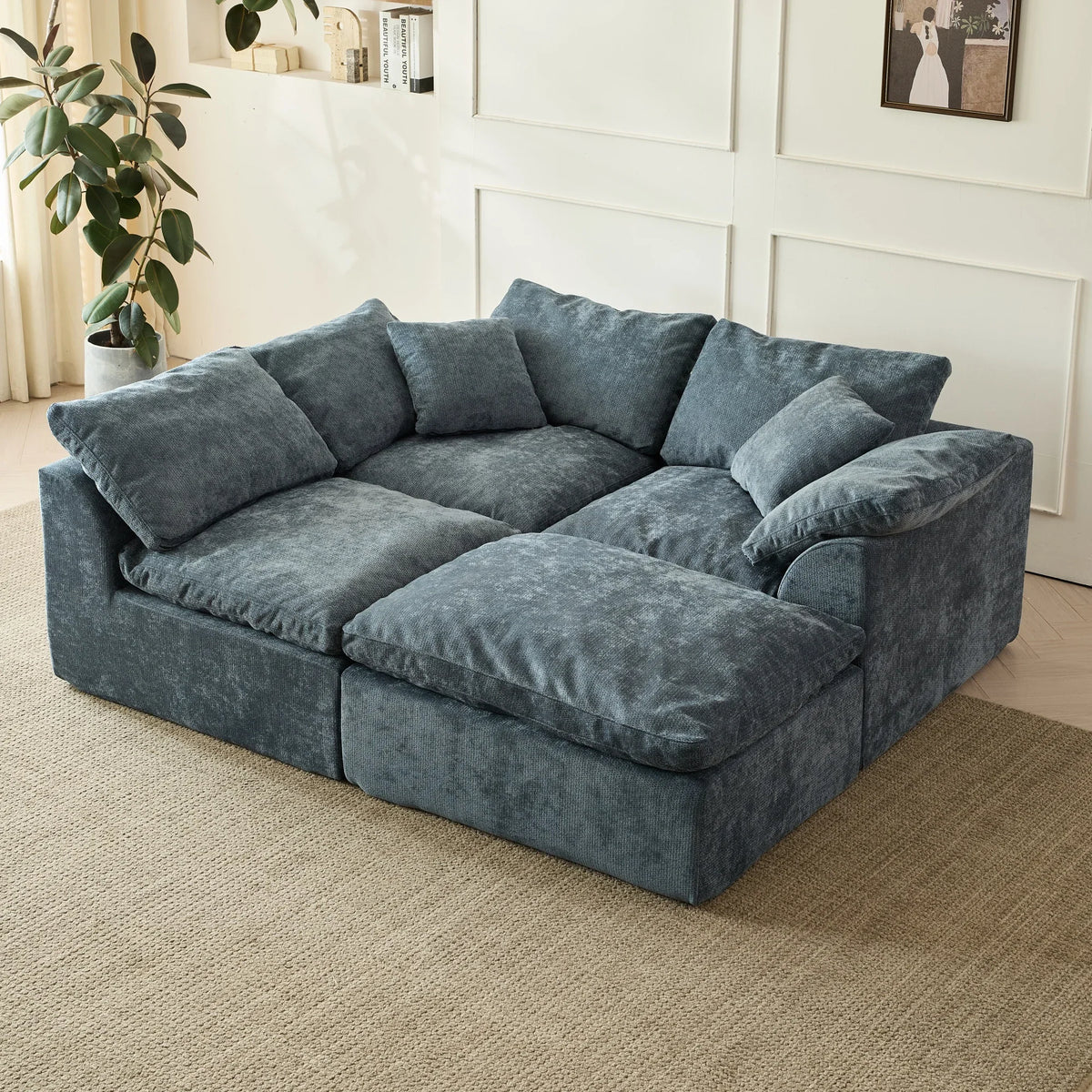 Blue modular sofa arranged in a square configuration.