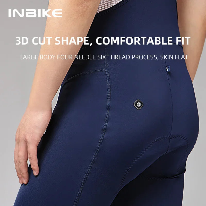 Side view detail of navy men's cycling bib shorts showing flatlock stitching
