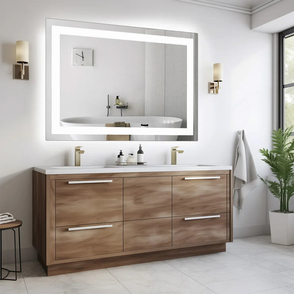 Rectangular LED backlit bathroom mirror with front light above a wood vanity cabinet