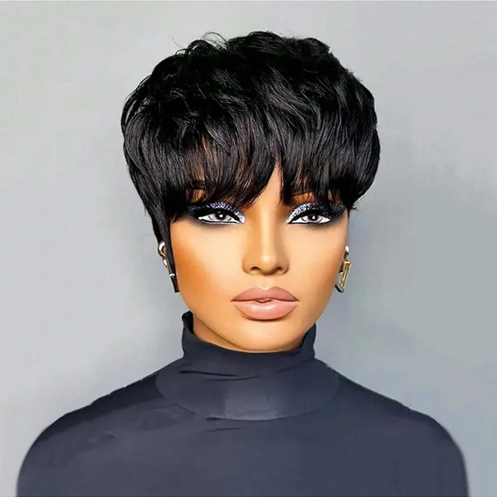 A front view of a woman with a short, layered black pixie cut wig featuring bangs.