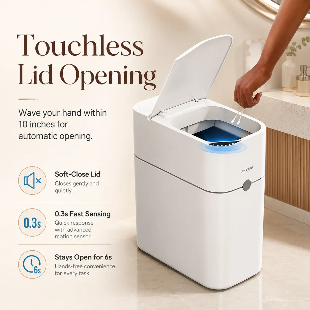 White rectangular touchless bathroom trash can with motion sensor lid opening in a modern bathroom
