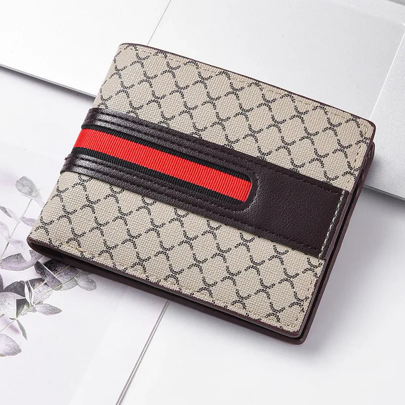 A beige bi-fold wallet for men with a dark brown leather strap and a red stripe detail, placed on a white surface with a