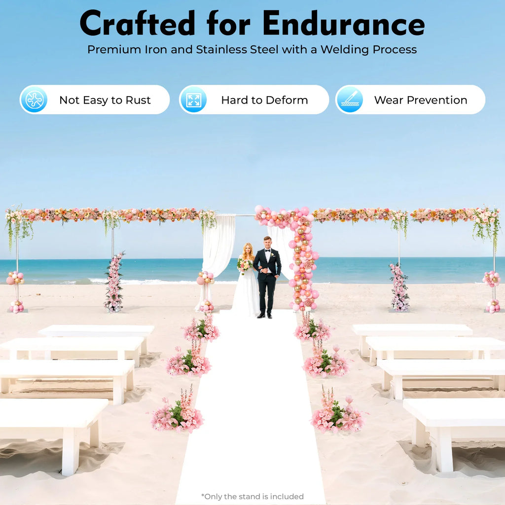 Wedding ceremony setup with a metal arch backdrop on a beach