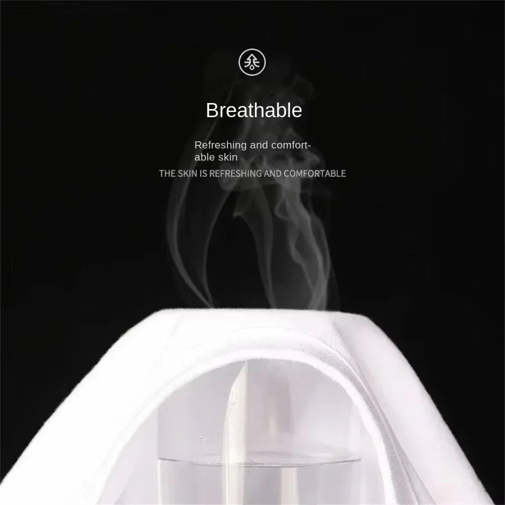A conceptual view of white breathable fabric with steam rising to show breathability.