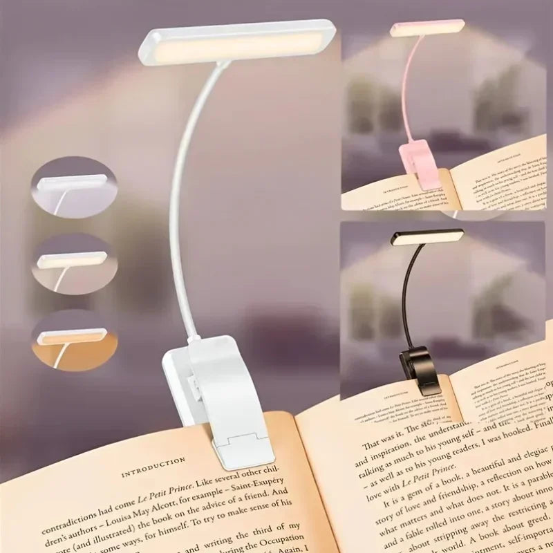 Three colors of rechargeable clip-on reading lights attached to books