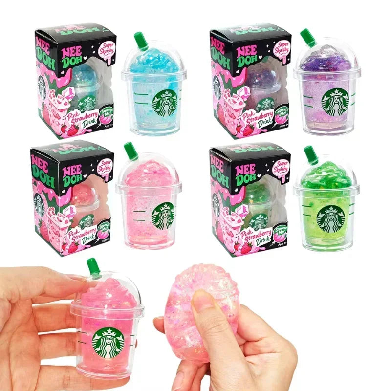 Set of glittery iced coffee cup squishy toys with individual retail packaging.