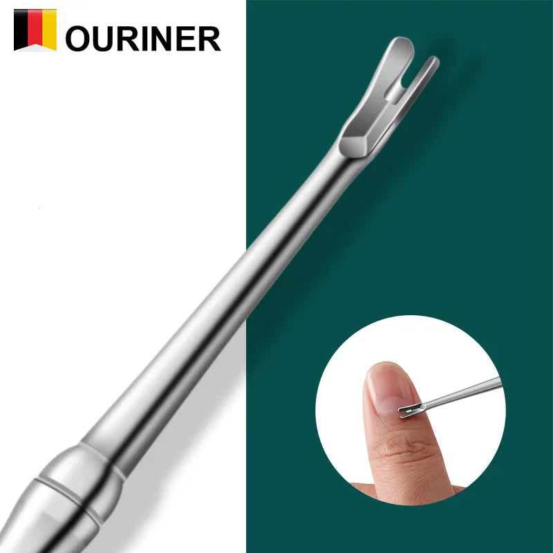 Stainless steel V-shaped cuticle pusher tool used on a fingernail