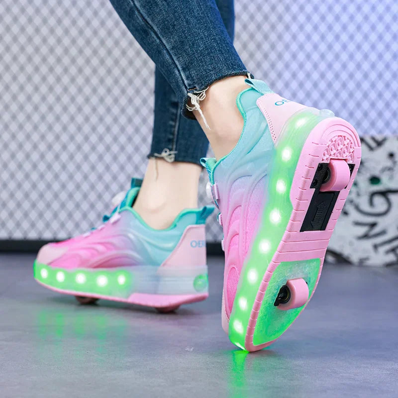 Gradient pink and turquoise LED roller skate shoes with two wheels showing the sole