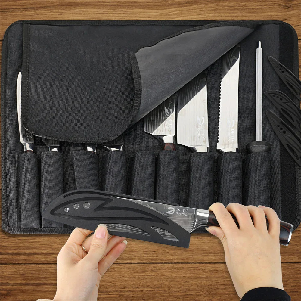 Hands holding a kitchen knife with a protective sheath inside a black roll-up carry bag.
