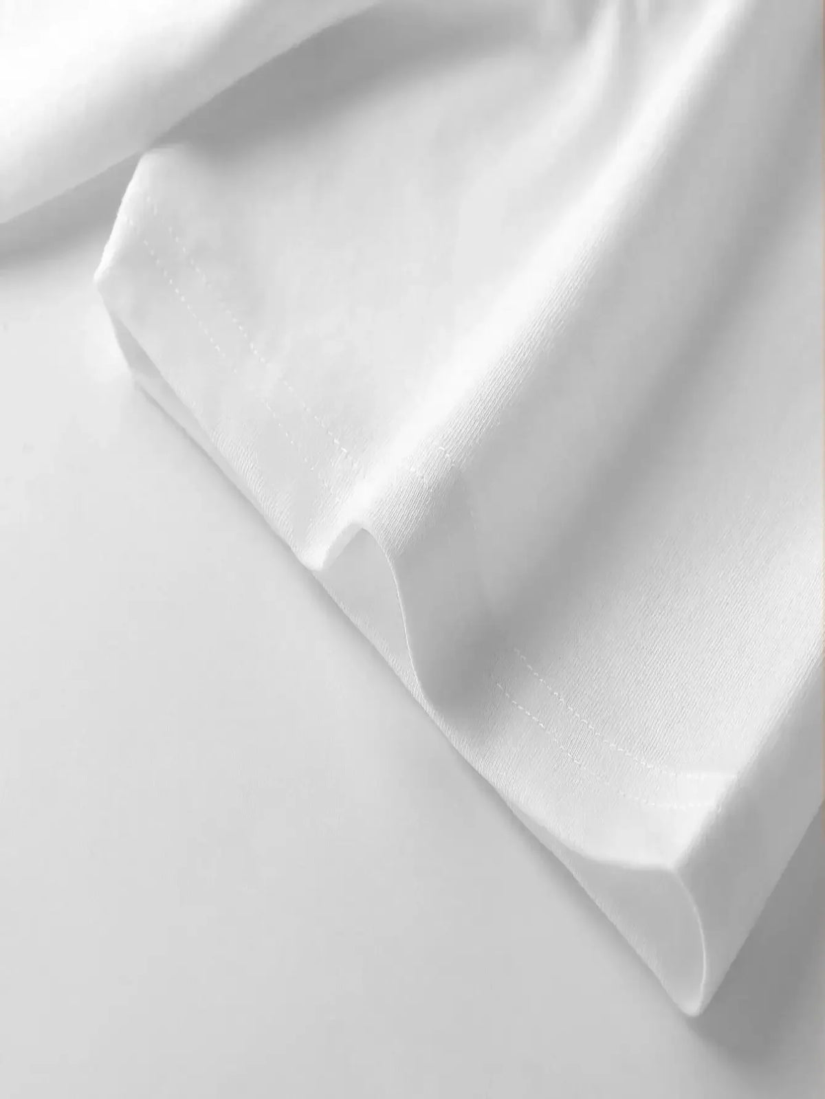 Close up fabric texture of white t-shirt