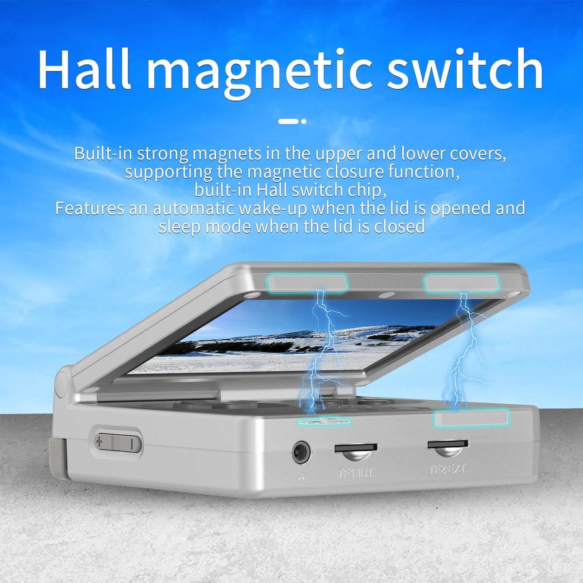 Flip handheld game console displaying magnetic switch function.