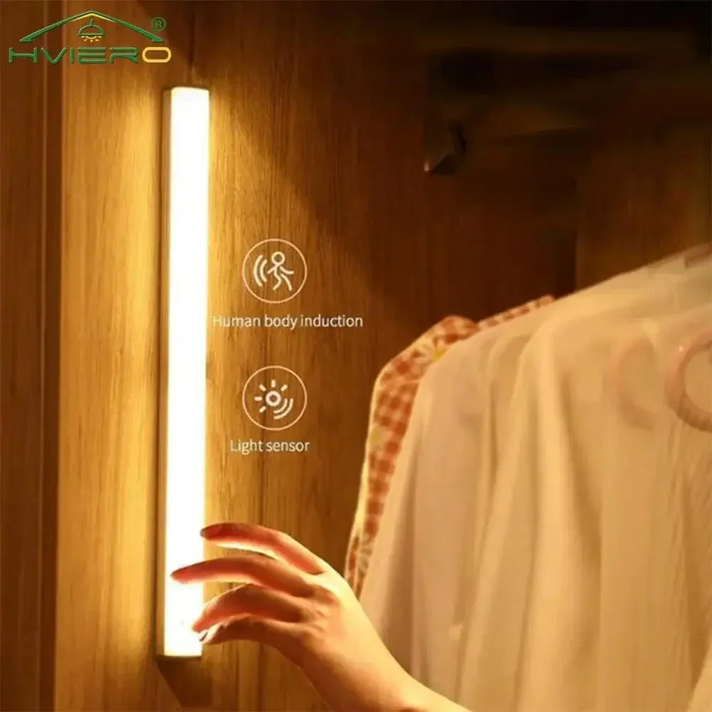 LED motion sensor light strip installed inside a wooden wardrobe