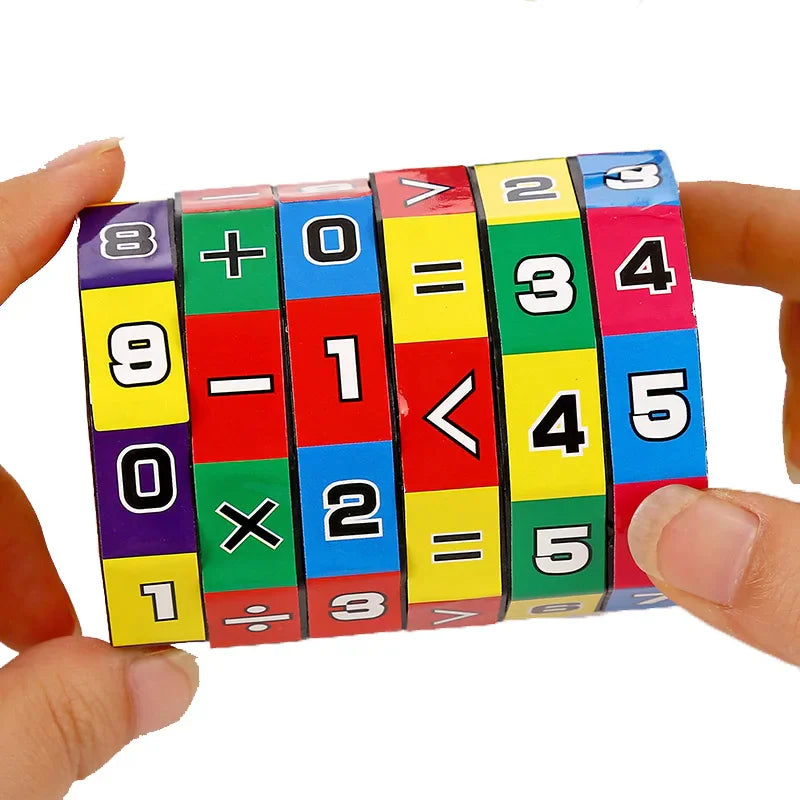 A colorful math cylinder puzzle with numbers and arithmetic symbols being held by hands