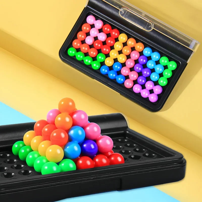 3D pyramid puzzle game with colorful plastic ball segments in a black storage case