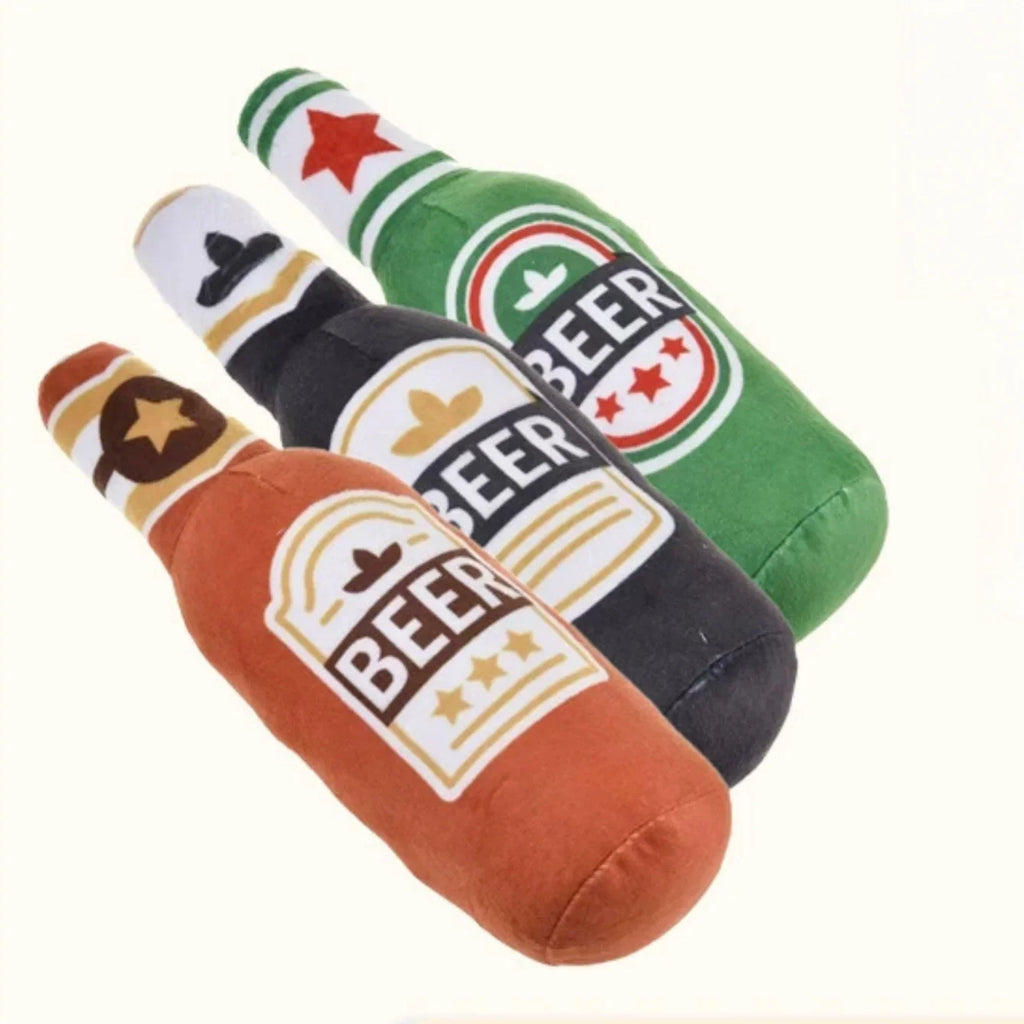 Trio of plush beer bottle dog toys in different colors