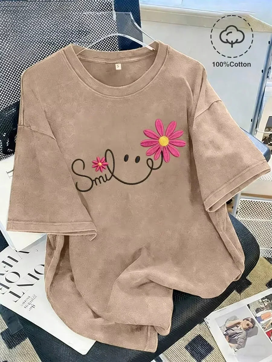 Brown washed cotton t-shirt with smile and floral graphic print