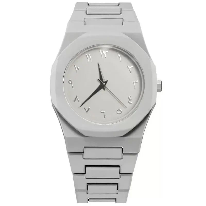 A quartz wristwatch with an irregular 40mm plastic case and a silicone band available in five colors – Grey