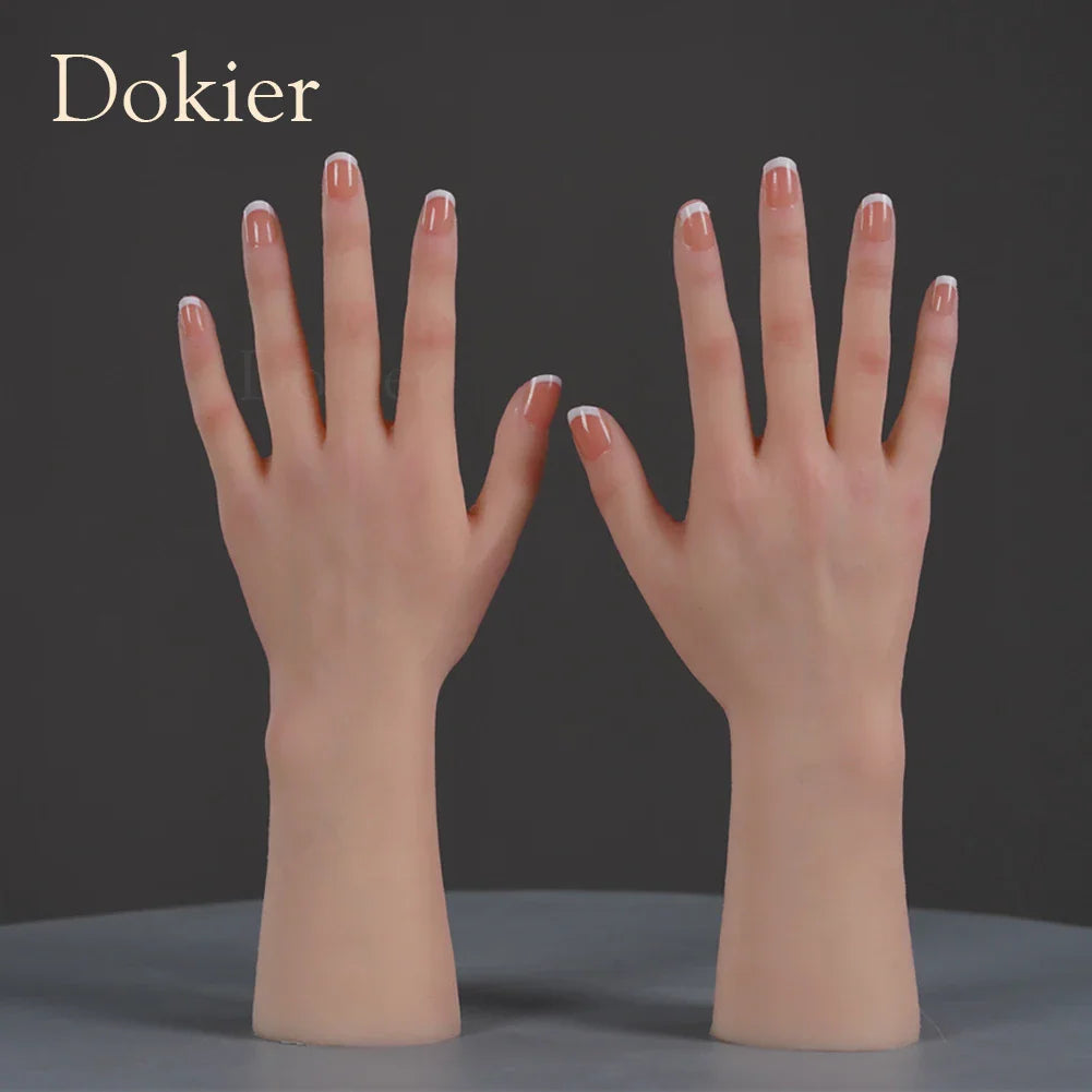 A pair of realistic female mannequin hands made of silicone with French manicured nails.
