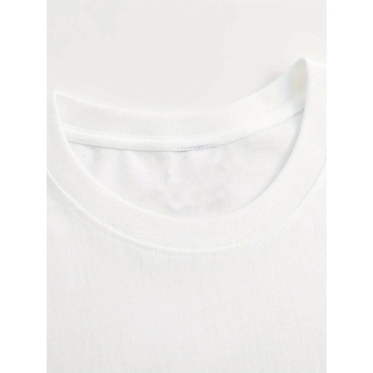 Close-up of the crew neck collar of a white t-shirt