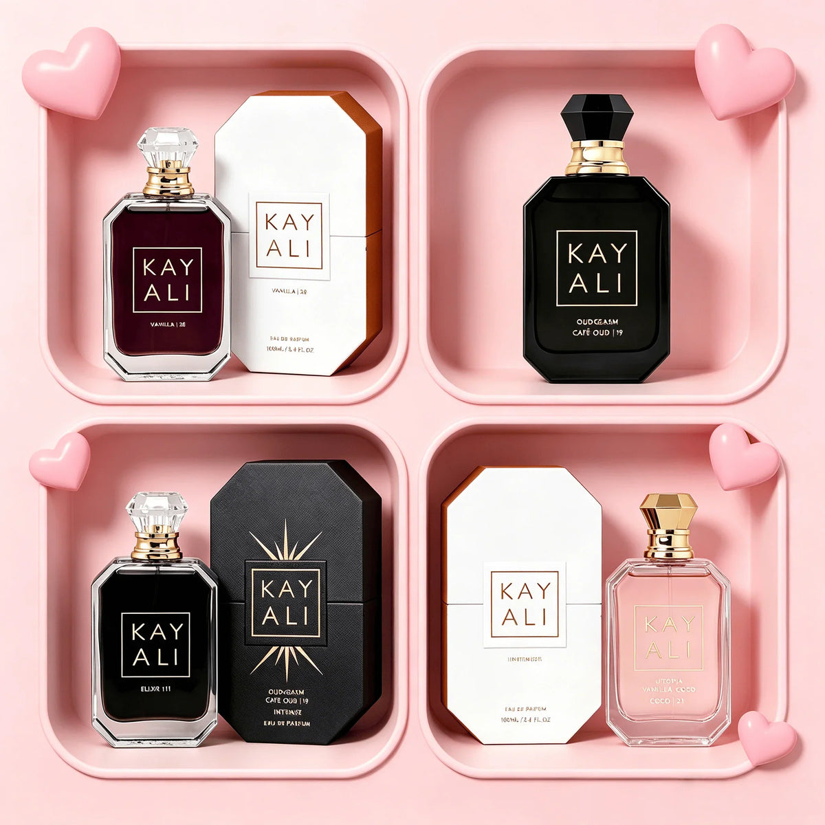 Selection of four different perfumes with their boxes, displayed in pink compartments with heart decorations.
