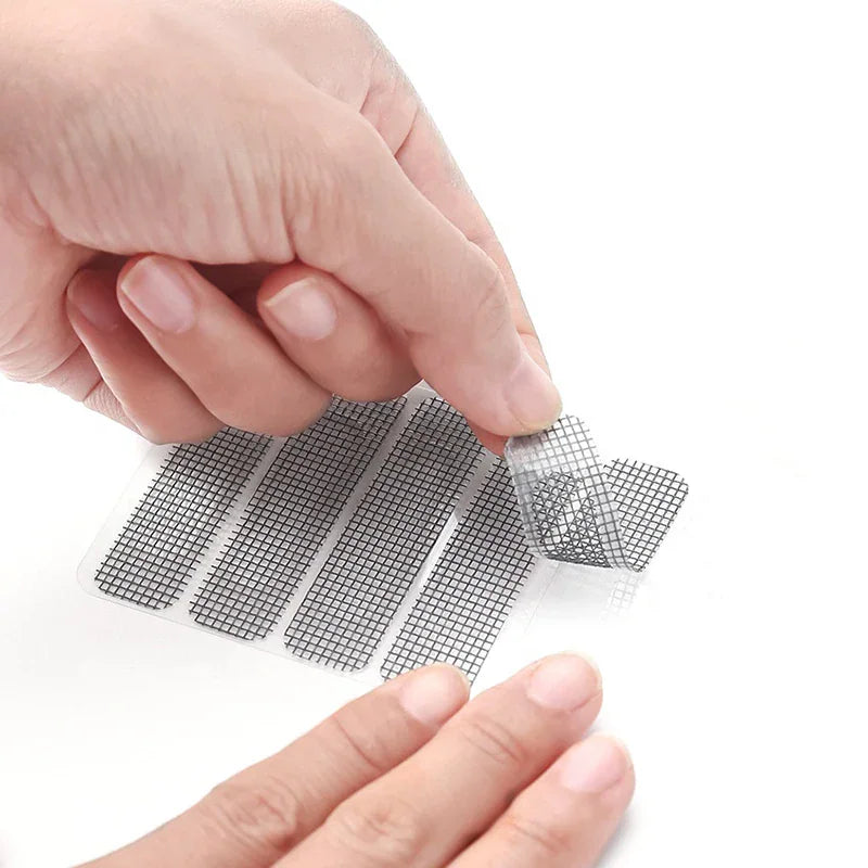 Hand peeling a rectangular self-adhesive mesh screen repair patch